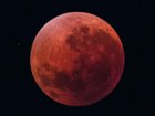 The moon’s vibrant red hue is commonly referred to as a ‘blood moon’. 