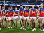 Brisbane Lions leave the field after the loss to Geelong. 