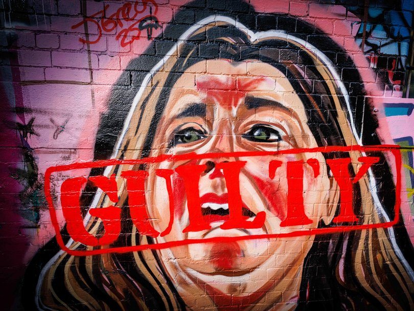 A mural of mushroom murderer Erin Patterson had "Guilty" scrawled across it.