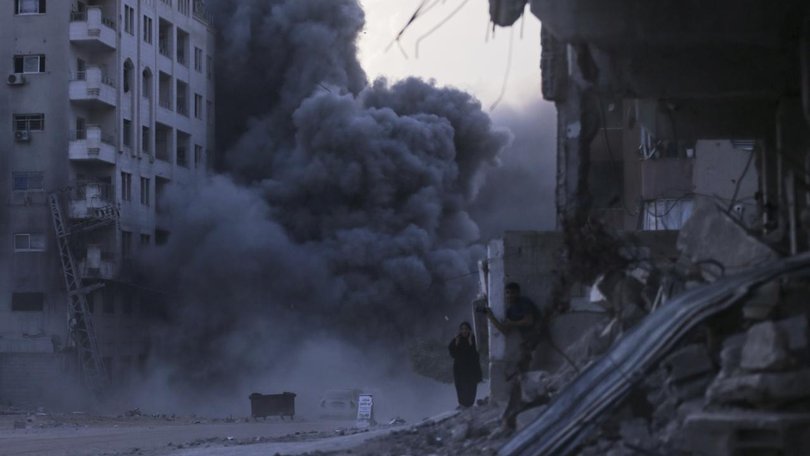 Israeli forces bombed Gaza City from the air, residents say, as they continued their offensive.