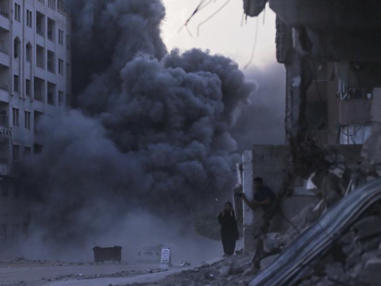 Israeli forces bombed Gaza City from the air, residents say, as they continued their offensive.