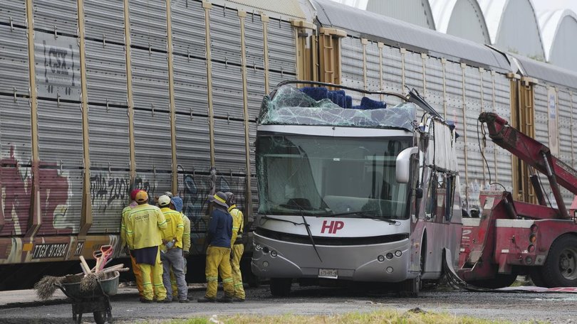A double-decker passenger bus was hit by a freight train in Mexico, killing 10 people.