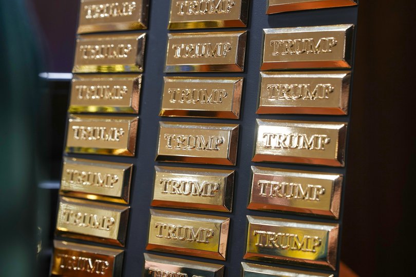 Trump branded gold coloured bullion fridge magnets are seen for sale at the recently opened Trump merchandise store at Trump Turnberry golf course in Scotland.