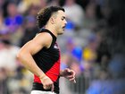 Essendon ruck Sam Draper exits the field in round six after suffering a season-ending injury. 