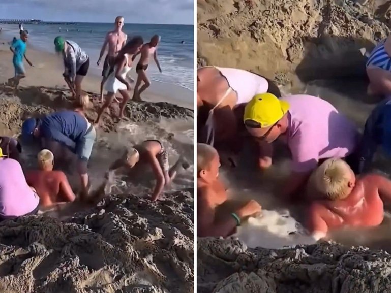 Two boys get stuck in sinkhole as water rushes in.