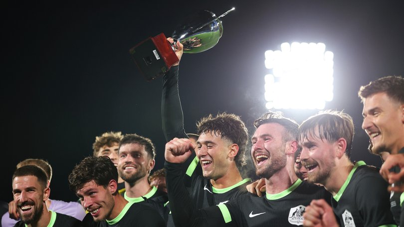 Alessandro Circati lifts the Soccer Ashes 2025 trophy after the win over New Zealand.