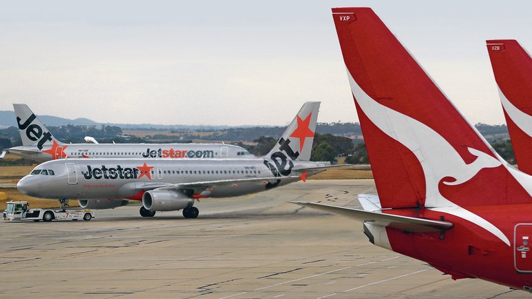 Federal police were called to the tarmac to remove a man, causing major delays.