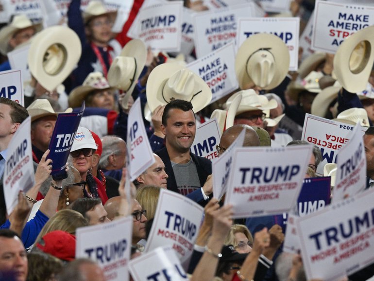 Charlie Kirk stands among attendees during Day 3 of the Republican National Convention in 2024 in Milwaukee. 