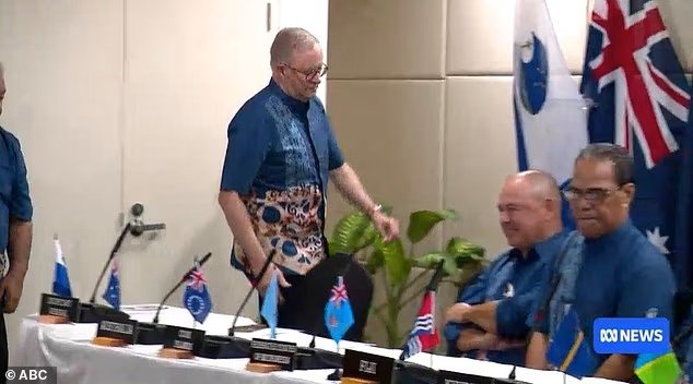 Albanese left the room for a quick change.