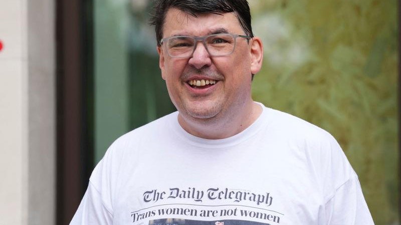 Father Ted creator Graham Lineham was arrested over transgender comments as he landed in Heathrow.