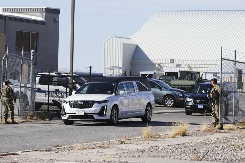 The hearse carrying Charlie Kirk arrives at the Roland R. Wright Air National Guard Base.