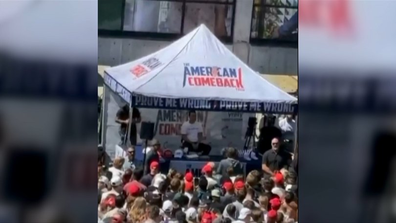 Charlie Kirk speaking at the event moments before he was shot dead.