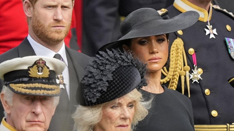 (Back) Harry and Meghan. (Front) Charles and Camilla. 