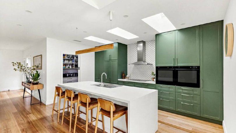 Green seems to have cemented itself as a versatile and timeless hue in interior design.