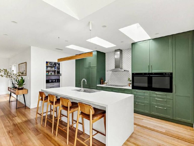Green seems to have cemented itself as a versatile and timeless hue in interior design.