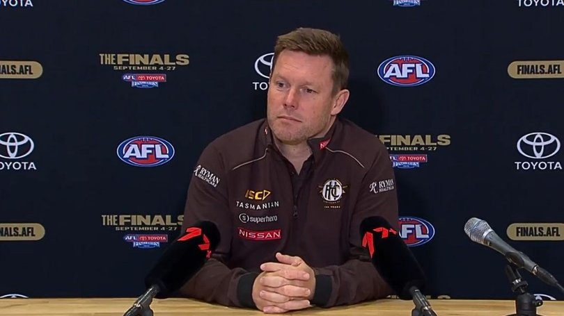 Hawthorn coach Sam Mitchell has no regrets about trying to recruit Essendon’s contracted captain Zach Merrett.