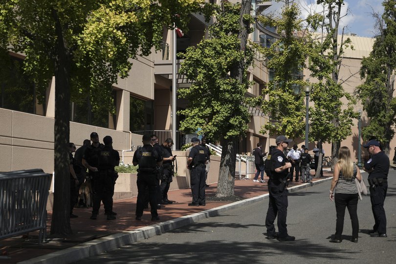 Members of the US Capitol Police outside of the Democratic National Committee headquarters in Washington, on Thursday.