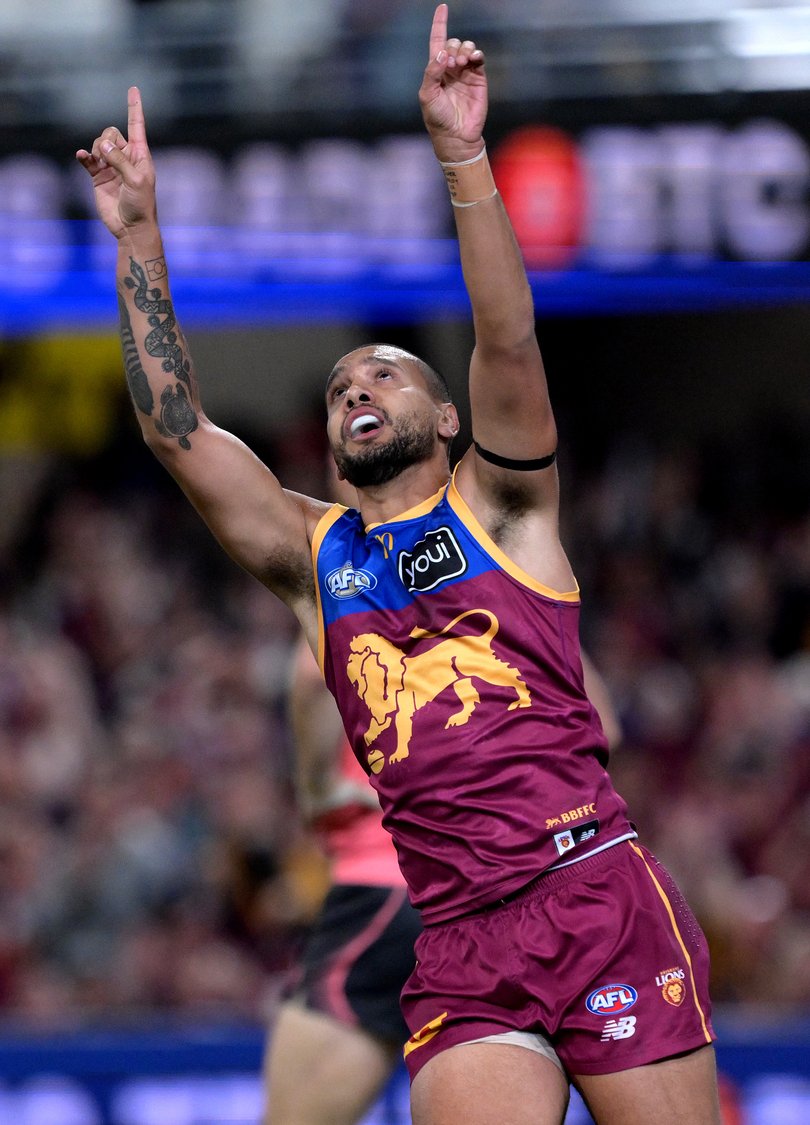 BRISBANE, AUSTRALIA - SEPTEMBER 13: Callum Ah Chee of the Lions celebrates after kicking a goal during the AFL Semi Final match between Brisbane Lions and Gold Coast Suns at The Gabba on September 13, 2025 in Brisbane, Australia. (Photo by Bradley Kanaris/Getty Images via AFL Photos)