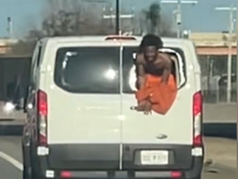 Footage captures the heart-stopping moment a prisoner smashed a van window, dangled outside.