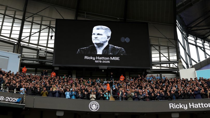 Players, fans, officials observe a minutes applause in memory of Ricky Hatton, prior to the Premier League match between Manchester City and Manchester United at Etihad Stadium.