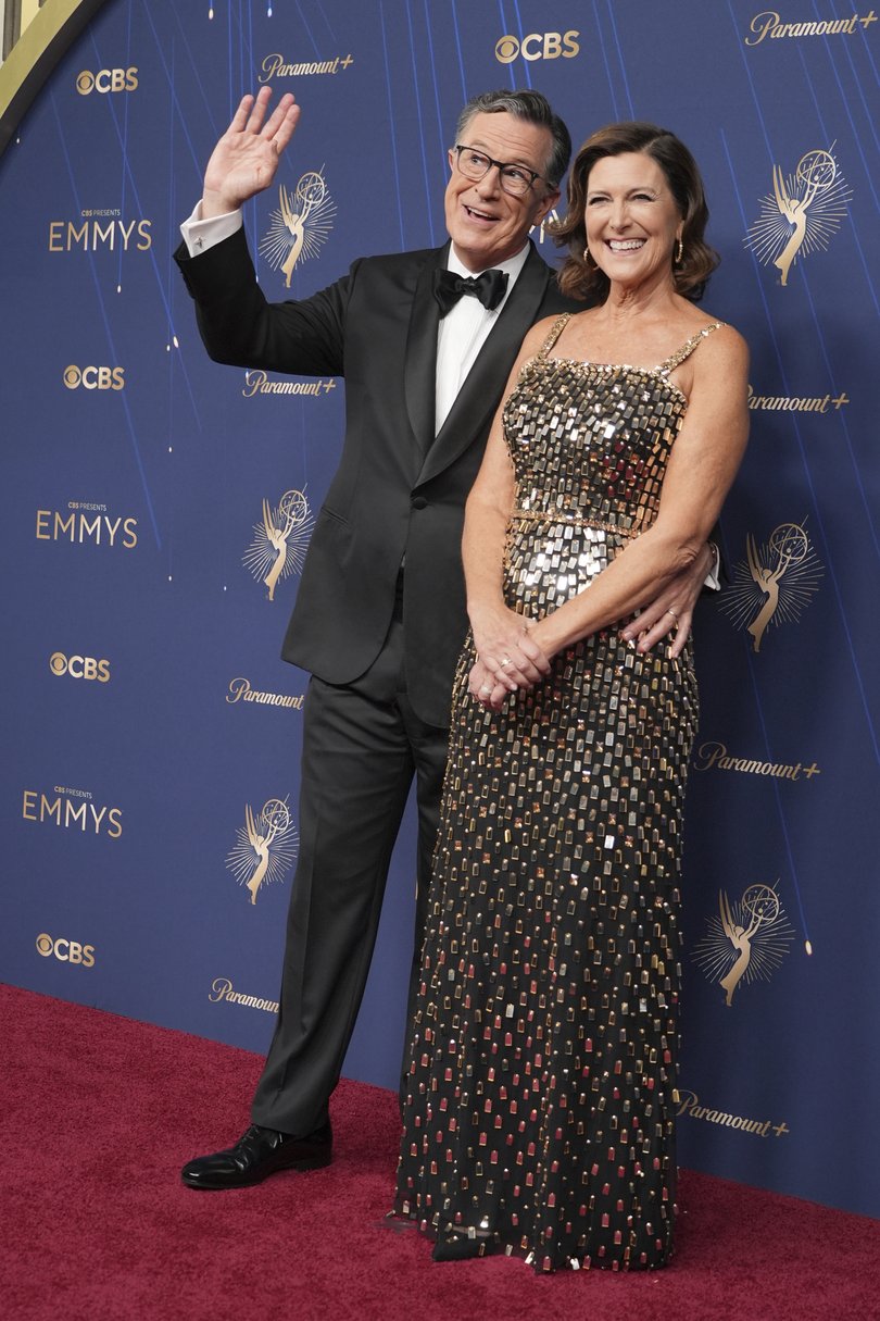 Stephen Colbert, left, and Evelyn McGee-Colbert arrive at the 77th Primetime Emmy Awards on Sunday, Sept. 14, 2025, at the Peacock Theater in Los Angeles. (AP Photo/Jae C. Hong)