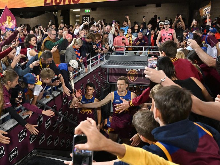 A season-record Gabba crowd attended the AFL semi-final between Brisbane and the Gold Coast.