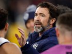 MELBOURNE, AUSTRALIA - SEPTEMBER 05: Chris Scott, Senior Coach of the Cats addresses his players during the AFL Second Qualifying Final match between the Geelong Cats and the Brisbane Lions at the Melbourne Cricket Ground on September 05, 2025 in Melbourne, Australia. (Photo by Michael Willson/AFL Photos via Getty Images)