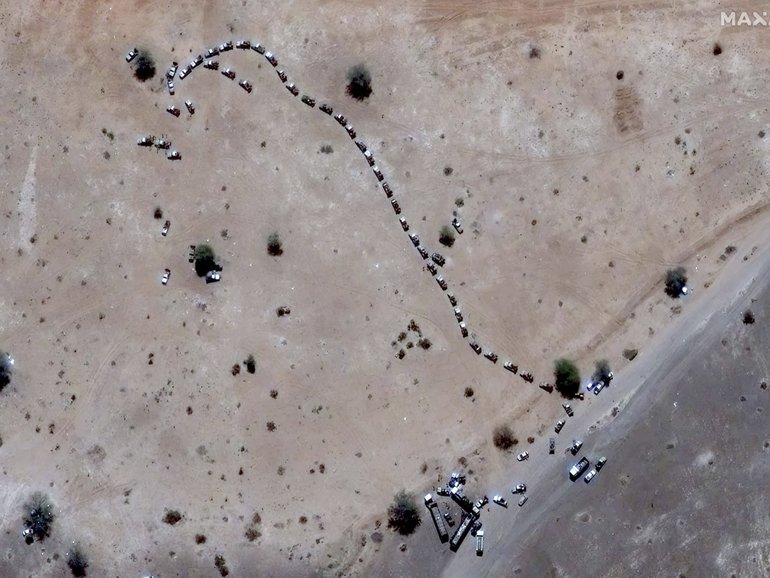 Weapon-mounted vehicles on the eastern edge of Zamzam camp after it was seized by Rapid Support Forces paramilitaries. 
