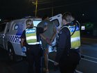 The 22-year-old man was placed in the back of a police van.