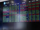 Six of 11 local sectors were trading higher by lunchtime, led by materials and energy stocks. (Bianca De Marchi/AAP PHOTOS)