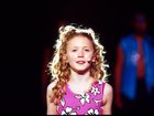 Nikki Webster pictured singing at the opening of the Sydney Olympics.   