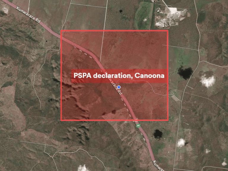 Police are urging locals to stay indoors as officers comb nearby bushland for the occupants who fled the scene.