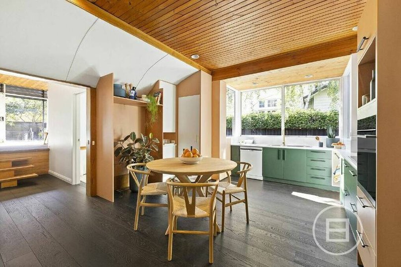The kitchen and dining area inside the three-bedroom dwelling.