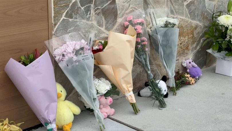 Tributes have been left at the scene of a fatal carpark tragedy in Sydney.