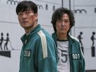 Lee Jung-jae, right, and Park Hae-soo in a scene from the Korean series "Squid Game."  (Netflix via AP)