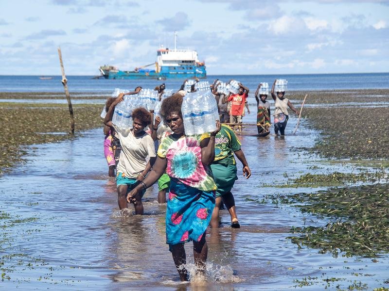 Villagers in northern Bougainville in search of aid in July.