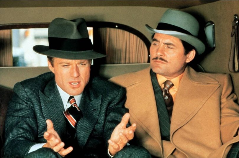Robert Redford with Robert Shaw in The Sting.