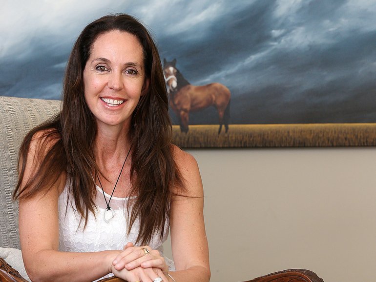 Cover. Boost Juice Founder and mother of four children Janine Allis is pictured at home in Malvern East.