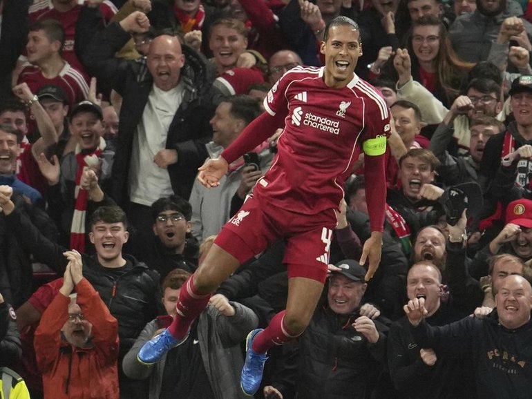 Liverpool skipper Virgil van Dijk has scored a late winner against Atletico Madrid at Anfield. (AP PHOTO)