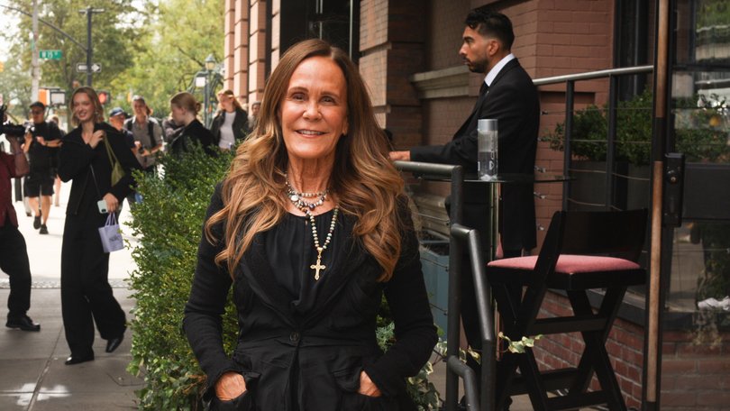 Julie Gilhart in a J. Crew dress with her Nina Ricci blazer outside a Kallmeyer show.