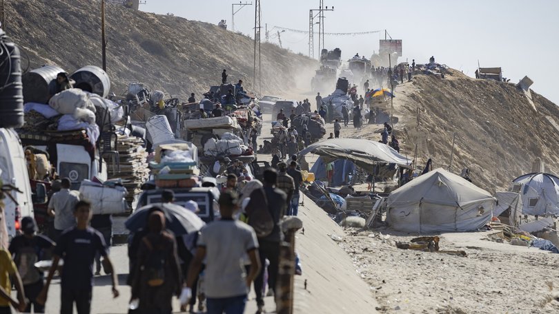 People flee along the coastal Rashid Street from Gaza City, on Tuesday, September 16, 2025.