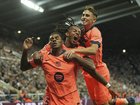 Marcus Rashford (l) scored twice in Barcelona's 2-1 win over Newcastle at St James Park in England. (AP PHOTO)