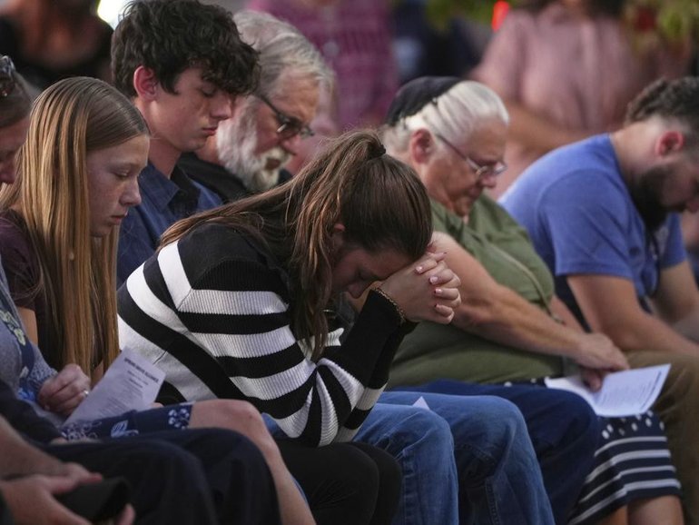 A vigil was held for slain police in the usually quiet farm country of southeastern Pennsylvania. (AP PHOTO)