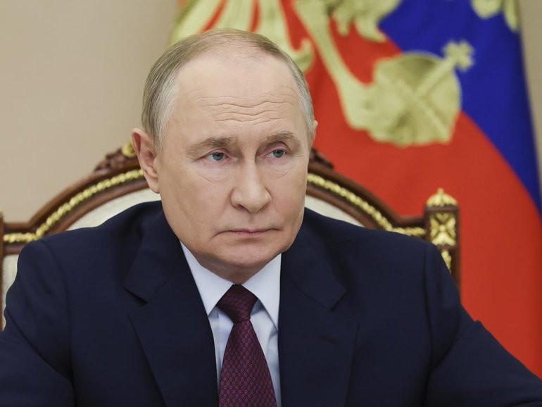 Vladimir Putin has "bitten off more than he can chew" in the war in Ukraine, the UK's spy chief says.