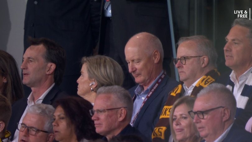 Andrew Dillon watches the preliminary final with Richard Goyder, Anthony Albanese and Richard Marles.