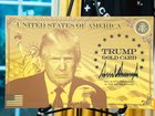 A replica “Trump Gold Card” on display Friday in the Oval Office. MUST CREDIT: Demetrius Freeman/The Washington Post