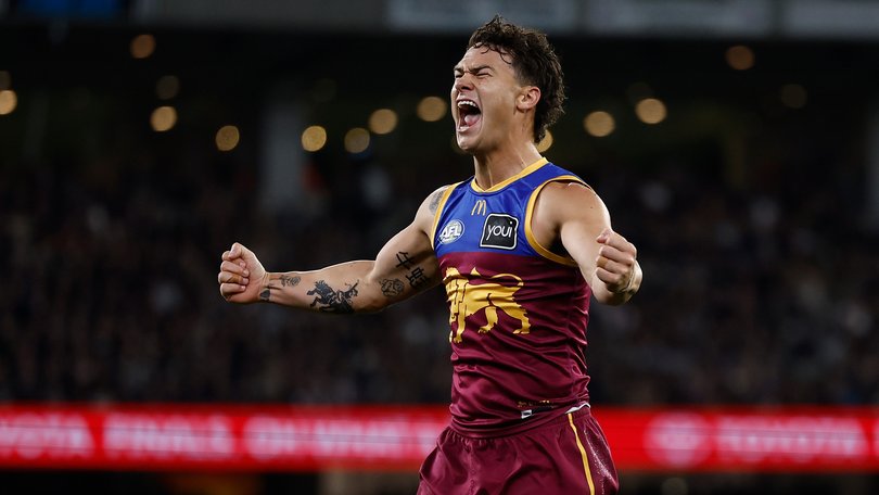 Cam Rayner of the Lions celebrates a goal.