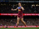 Cam Rayner of the Lions celebrates a goal.
