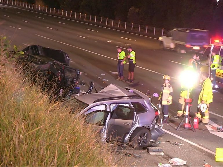 Baby boy dies, woman seriously injured, after major crash on M1 at Gaven, Gold Coast.