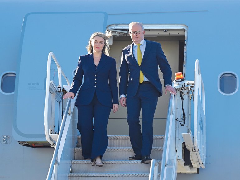 Australian Prime Minister Anthony Albanese and partner Jodie Haydon arrive at John F. Kennedy airport in New York, United States, Saturday, September 20, 2025. (AAP Image/Lukas Coch) NO ARCHIVING LUKAS COCH